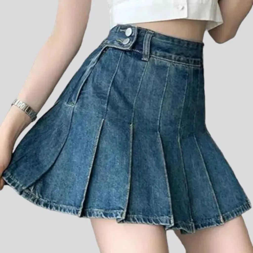 Medium-wash pleated jean skort