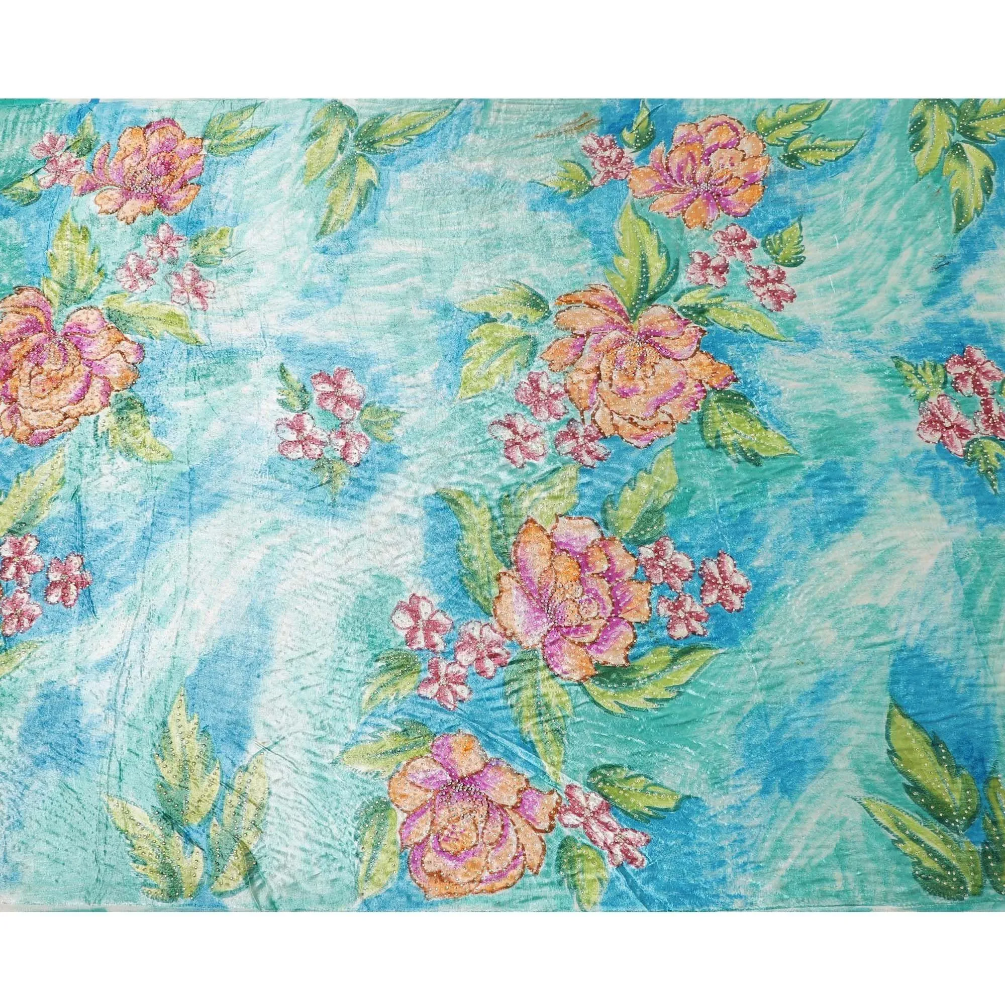 Turquoise blue to cerulean blue Rayon velvet fabric having white and yellow stonework in floral design